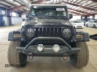 2004 Jeep Wrangler Sport with VIN 1J4FA49S64P722986, listed as a Copart auction lot 51840985 with 129,761 mi miles and Clean Title. Bid and sale history available at carsss.com. Image 5.