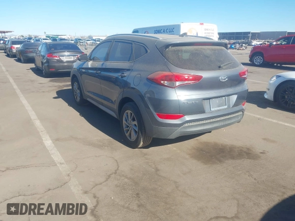 2018 Hyundai Tucson SEL z VIN KM8J33A42JU681606, wystawiony jako IAAI lot #41067514 z przebiegiem 150 119 mil mil oraz . Historia ofert i sprzedaży dostępna na DreamBid. Obrazek 3.