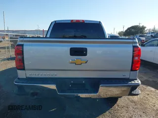 2018 Chevrolet Silverado 1500 LT with VIN 3GCPCREC9JG574686, listed as a IAAI auction lot 41676124 with 74,239 mi miles and . Bid and sale history available at DreamBid. Image 16.