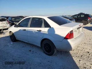2007 Ford Focus S with VIN 1FAFP34N47W243028, listed as a Copart auction lot 55147695 with 218,672 mi miles and Salvage title. Bid and sale history available at DreamBid. Image 2.