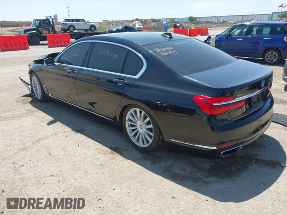 2017 BMW 7 Series 740i xDrive with VIN WBA7E4C50HGU99106, listed as a IAAI auction lot 41997603 with 138,322 mi miles. Bid and sale history available at carsss.com. Image 3.