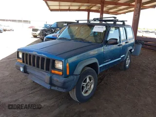 1997 Jeep Cherokee SE with VIN 1J4FT28S6VL527530, listed as a IAAI auction lot 42700148 with 273,412 mi miles and . Bid and sale history available at DreamBid. Image 2.
