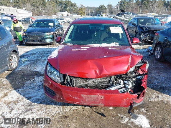 2013 Volkswagen Tiguan S with VIN WVGAV3AX1DW098392, listed as a IAAI auction lot 41420676 with 75,279 mi miles and . Bid and sale history available at DreamBid. Image 12.