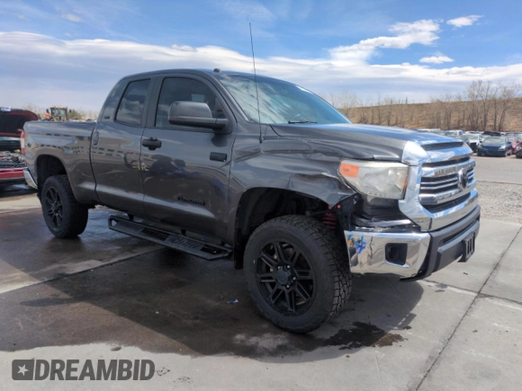 2017 Toyota Tundra SR z VIN 5TFUW5F19HX656990, wystawiony jako Copart lot #51087865 z przebiegiem 123 481 mil mil oraz Szkoda całkowita • Salvage title. Historia ofert i sprzedaży dostępna na DreamBid. Obrazek 4.