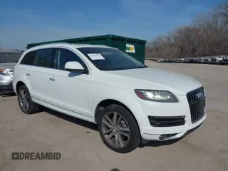 2014 Audi Q7 3.0L TDI Prestige with VIN WA1VMAFE2ED013300, listed as a IAAI auction lot 41801591 with 164,514 mi miles. Bid and sale history available at carsss.com. Image 1.