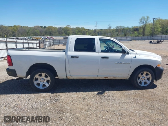 2012 Ram 1500 Tradesman with VIN 1C6RD7KP3CS235250, listed as a IAAI auction lot 41849020 with 138,068 mi miles and . Bid and sale history available at DreamBid. Image 14.