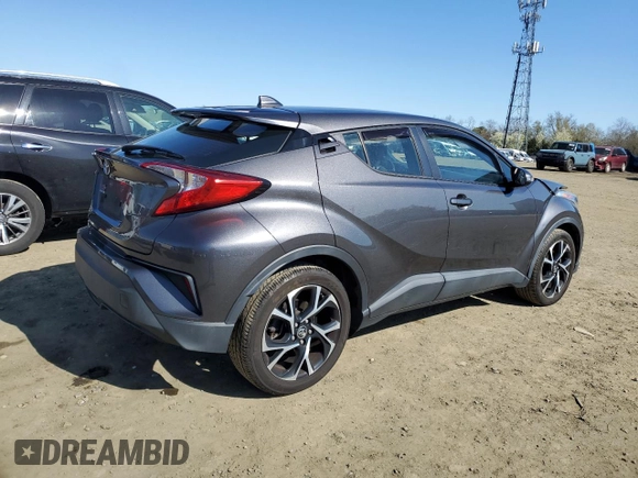 2019 Toyota C-HR XLE z VIN NMTKHMBX4KR084471, wystawiony jako Copart lot #52575985 z przebiegiem 54 578 mil mil oraz Szkoda całkowita • Salvage title. Historia ofert i sprzedaży dostępna na DreamBid. Obrazek 3.