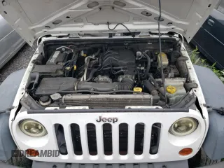 2013 Jeep Wrangler Unlimited Sport z VIN 1C4BJWDGXDL632315, wystawiony jako Copart lot #66711564 z przebiegiem 131 907 mil mil oraz Tytuł czysty. Historia ofert i sprzedaży dostępna na DreamBid. Obrazek 12.