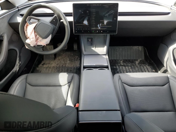 2025 Tesla Model 3 Long Range with VIN 5YJ3E1EB6SF921092, listed as a Copart auction lot 46918025 with 1,403 mi miles and Salvage Title. Bid and sale history available at DreamBid. Image 8.