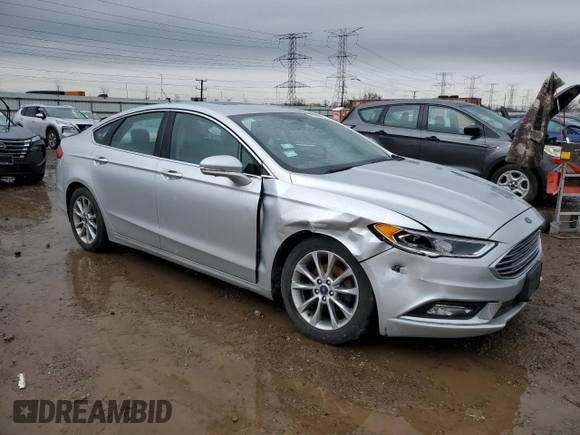 2017 Ford Fusion SE with VIN 3FA6P0HDXHR124355, listed as a Copart auction lot 51341715 with 99,984 mi miles and Salvage Title. Bid and sale history available at DreamBid. Image 4.