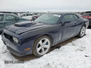 2014 Dodge Challenger R/T z VIN 2C3CDYBTXEH205467, wystawiony jako Copart lot #44422565 z przebiegiem 113 498 mil mil oraz Szkody całkowita. Historia ofert i sprzedaży dostępna na DreamBid. Obrazek 1.