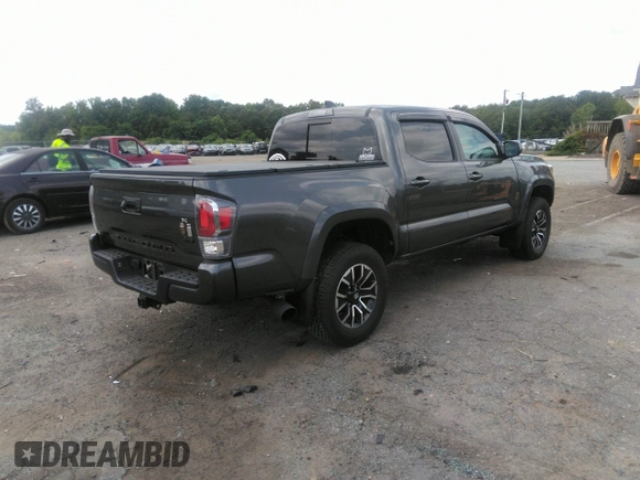 2021 Toyota Tacoma SR z VIN 3TYCZ5AN7MT017377, wystawiony jako IAAI lot #42285326 z przebiegiem 91 657 mil mil oraz . Historia ofert i sprzedaży dostępna na DreamBid. Obrazek 4.