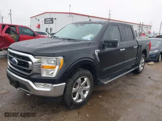 2021 Ford F-150 XL with VIN 1FTFW1E59MFC30173, listed as a IAAI auction lot 41445639 with 176,857 mi miles. Bid and sale history available at carsss.com. Image 2.