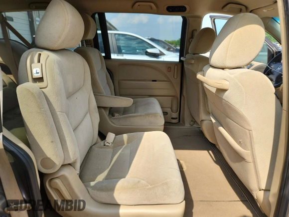 2008 Honda Odyssey LX z VIN 5FNRL38218B052952, wystawiony jako Copart lot #60907585 z przebiegiem 82 876 mil mil oraz Szkoda całkowita • Salvage title. Historia ofert i sprzedaży dostępna na DreamBid. Obrazek 11.