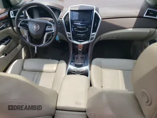 2016 Cadillac SRX Performance Collection with VIN 3GYFNCE32GS508631, listed as a Copart auction lot 60660554 with 92,025 mi miles and Salvage title. Bid and sale history available at DreamBid. Image 8.