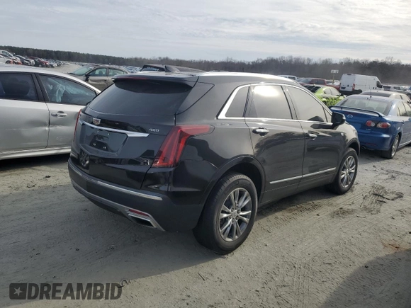 2023 Cadillac XT5 FWD Premium Luxury z VIN 1GYKNCRS6PZ145494, wystawiony jako Copart lot #45475375 z przebiegiem 48 339 mil mil oraz Szkoda całkowita • Salvage title. Historia ofert i sprzedaży dostępna na DreamBid. Obrazek 3.