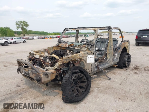 2021 Jeep Wrangler Unlimited Freedom with VIN 1C4HJXDN8MW765099, listed as a IAAI auction lot 42394438 with Not provided miles and . Bid and sale history available at DreamBid. Image 2.