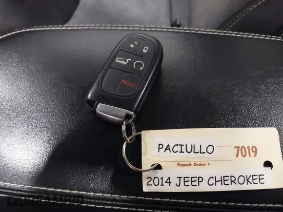 2014 Jeep Cherokee Latitude with VIN 1C4PJMCS6EW299532, listed as a IAAI auction lot 41833888 with 199,915 mi miles and . Bid and sale history available at DreamBid. Image 11.
