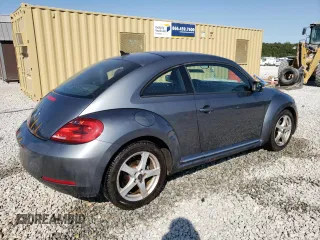 2014 Volkswagen Beetle 2.5L w/Sun with VIN 3VWJP7AT4EM612608, listed as a Copart auction lot 74679104 with 141,559 mi miles and Salvage Title. Bid and sale history available at DreamBid. Image 3.