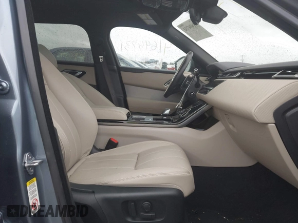2021 Land Rover Range Rover Velar R-Dynamic S z VIN SALYT2EX7MA313759, wystawiony jako IAAI lot #41694731 z przebiegiem Nie podano mil oraz . Historia ofert i sprzedaży dostępna na DreamBid. Obrazek 5.