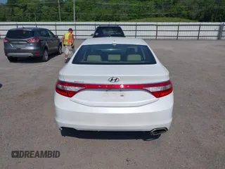 2015 Hyundai Azera z VIN KMHFG4JG3FA447672, wystawiony jako IAAI lot #42474930 z przebiegiem 125 425 mil mil oraz . Historia ofert i sprzedaży dostępna na DreamBid. Obrazek 16.