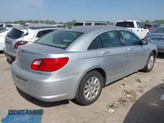 2010 Chrysler Sebring Touring with VIN 1C3CC4FB9AN115922, listed as a IAAI auction lot 42015051 with 152,305 mi miles and . Bid and sale history available at DreamBid. Image 4.