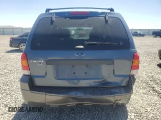 2005 Ford Escape XLT with VIN 1FMCU93105KA43061, listed as a Copart auction lot 62324555 with 121,517 mi miles and Salvage title. Bid and sale history available at DreamBid. Image 6.