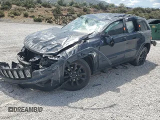 2018 Jeep Grand Cherokee Altitude with VIN 1C4RJFAG9JC195583, listed as a Copart auction lot 59632835 with 120,097 mi miles and Salvage title. Bid and sale history available at DreamBid. Image 1.