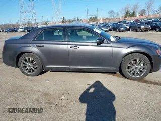 2014 Chrysler 300 with VIN 2C3CCAGG8EH298091, listed as a IAAI auction lot 41760483 with 141,663 mi miles. Bid and sale history available at carsss.com. Image 14.