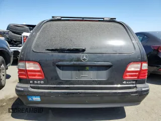 2001 Mercedes-Benz E-Class AWD with VIN WDBJH82J71X051634, listed as a Copart auction lot 51299544 with 286,211 mi miles and Salvage Title. Bid and sale history available at carsss.com. Image 6.
