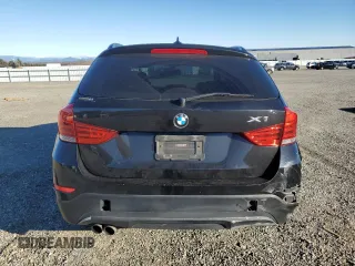 2015 BMW X1 sDrive28i with VIN WBAVM1C52FV315768, listed as a Copart auction lot 44970185 with 117,045 mi miles and Salvage Title. Bid and sale history available at carsss.com. Image 6.