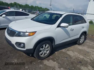 2013 Kia Sorento LX with VIN 5XYKT3A69DG348383, listed as a IAAI auction lot 42195952 with 179,451 mi miles and . Bid and sale history available at carsss.com. Image 2.
