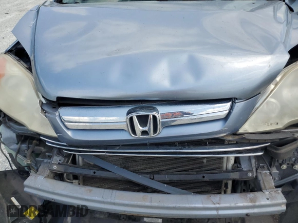 2007 Honda CR-V EX-L z VIN JHLRE38797C082267, wystawiony jako Copart lot #57602825 z przebiegiem 160 217 mil mil oraz Szkoda całkowita • Salvage title. Historia ofert i sprzedaży dostępna na DreamBid. Obrazek 12.