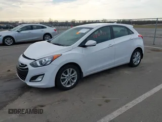 2013 Hyundai Elantra GT with VIN KMHD35LE1DU145894, listed as a IAAI auction lot 41828751 with 90,529 mi miles. Bid and sale history available at carsss.com. Image 19.