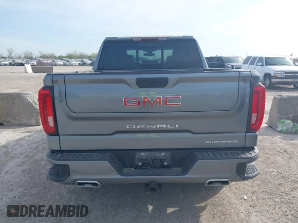 2021 GMC Sierra 1500 Denali z VIN 3GTU9FETXMG382438, wystawiony jako IAAI lot #41880365 z przebiegiem 54 651 mil mil oraz . Historia ofert i sprzedaży dostępna na DreamBid. Obrazek 17.