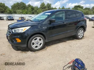 2017 Ford Escape S with VIN 1FMCU0F71HUA10588, listed as a Copart auction lot 62557745 with 135,193 mi miles and Salvage title. Bid and sale history available at DreamBid. Image 1.