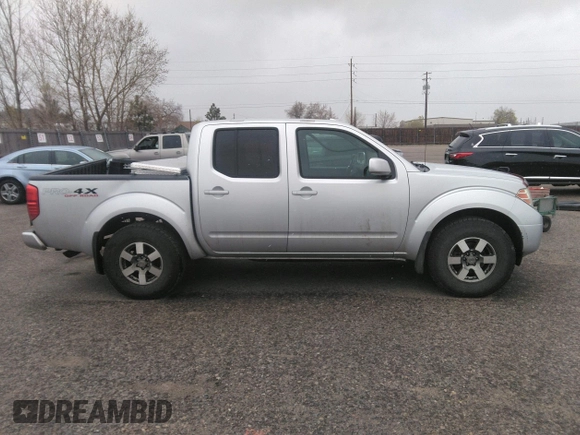 2011 Nissan Frontier Pro-4X with VIN 1N6AD0EV2BC438370, listed as a IAAI auction lot 41952484 with 217,529 mi miles and . Bid and sale history available at DreamBid. Image 13.