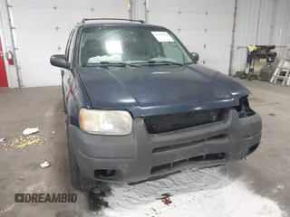 2003 Ford Escape XLT Popular with VIN 1FMYU03103KA06087, listed as a IAAI auction lot 42596326 with 210,441 mi miles and . Bid and sale history available at DreamBid. Image 6.