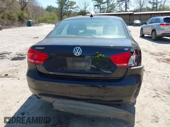 2013 Volkswagen Passat SE z VIN 1VWBP7A39DC094211, wystawiony jako IAAI lot #41894764 z przebiegiem 130 955 mil mil oraz . Historia ofert i sprzedaży dostępna na DreamBid. Obrazek 16.