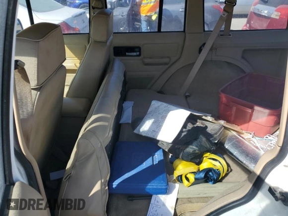 1993 Jeep Cherokee Sport с VIN 1J4FJ68S4PL555701, выставлен на аукционе Copart как лот 76020714 с пробегом 130 884 миль миль и Списание • Salvage title. История ставок и продаж доступна на DreamBid. Изображение 11.