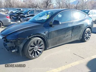 2022 Tesla Model Y Performance with VIN 7SAYGDEF0NF447541, listed as a IAAI auction lot 41762592 with 41,204 mi miles and . Bid and sale history available at DreamBid. Image 21.
