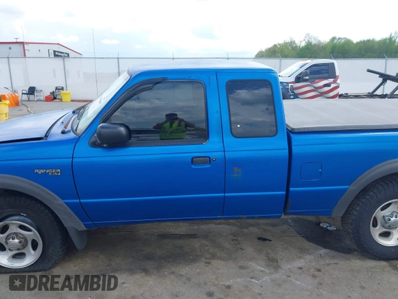 1999 Ford Ranger XLT z VIN 1FTZR15X5XTA79599, wystawiony jako IAAI lot #42109669 z przebiegiem 184 836 mil mil oraz . Historia ofert i sprzedaży dostępna na DreamBid. Obrazek 14.