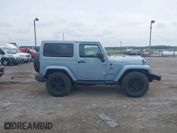 2012 Jeep Wrangler Arctic with VIN 1C4AJWBG7CL148325, listed as a IAAI auction lot 39943602 with 86,625 mi miles and . Bid and sale history available at DreamBid. Image 13.