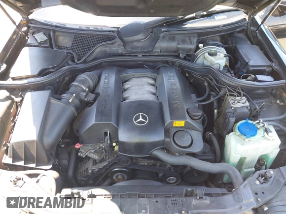 2002 Mercedes-Benz E-Class with VIN WDBJF65J62B404868, listed as a IAAI auction lot 42121837 with 107,415 mi miles. Bid and sale history available at carsss.com. Image 10.