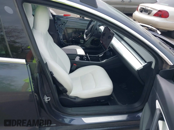 2020 Tesla Model 3 Long Range with VIN 5YJ3E1EB1LF639055, listed as a IAAI auction lot 42048009 with 43,493 mi miles. Bid and sale history available at carsss.com. Image 5.