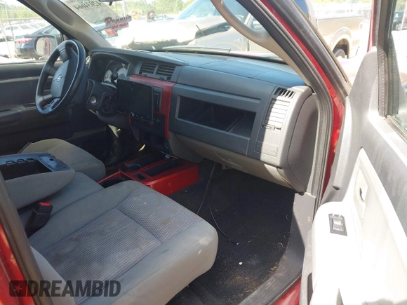 2009 Dodge Dakota SXT with VIN 1D7HE38K49S778966, listed as a IAAI auction lot 42034664 with 169,756 mi miles and . Bid and sale history available at carsss.com. Image 5.