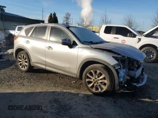 2013 Mazda CX-5 Grand Touring with VIN JM3KE4DEXD0155143, listed as a Copart auction lot 86852874 with 187,914 mi miles and Salvage Title. Bid and sale history available at carsss.com. Image 4.