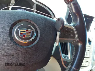2011 Cadillac SRX Performance Collection z VIN 3GYFNBEYXBS543464, wystawiony jako IAAI lot #42350098 z przebiegiem 146 747 mil mil oraz . Historia ofert i sprzedaży dostępna na DreamBid. Obrazek 11.