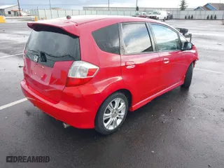 2009 Honda Fit Sport w/Navi with VIN JHMGE88619S009748, listed as a IAAI auction lot 41920104 with 129,532 mi miles. Bid and sale history available at carsss.com. Image 4.