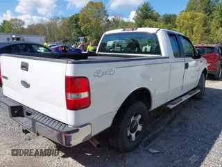 2007 Ford F-150 STX with VIN 1FTRX14W87FA14579, listed as a IAAI auction lot 40503694 with 164,718 mi miles. Bid and sale history available at carsss.com. Image 4.